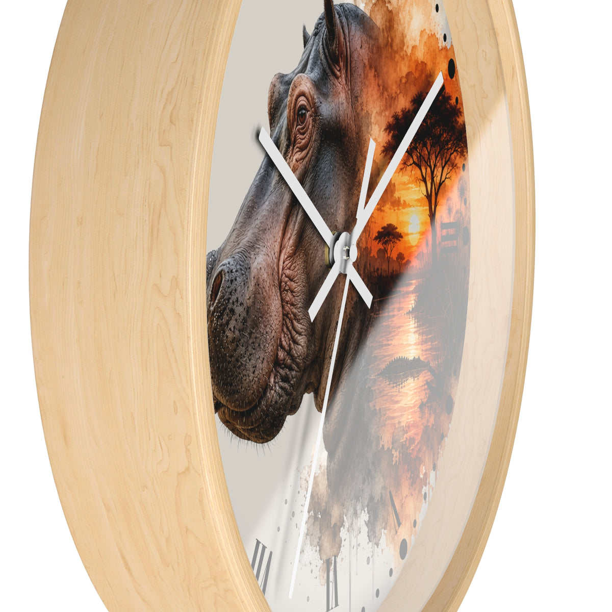 Round wall clock with a light natural wood frame and a printed face featuring a close-up hippopotamus head layered over an African savanna sunset scene, with white clock hands.