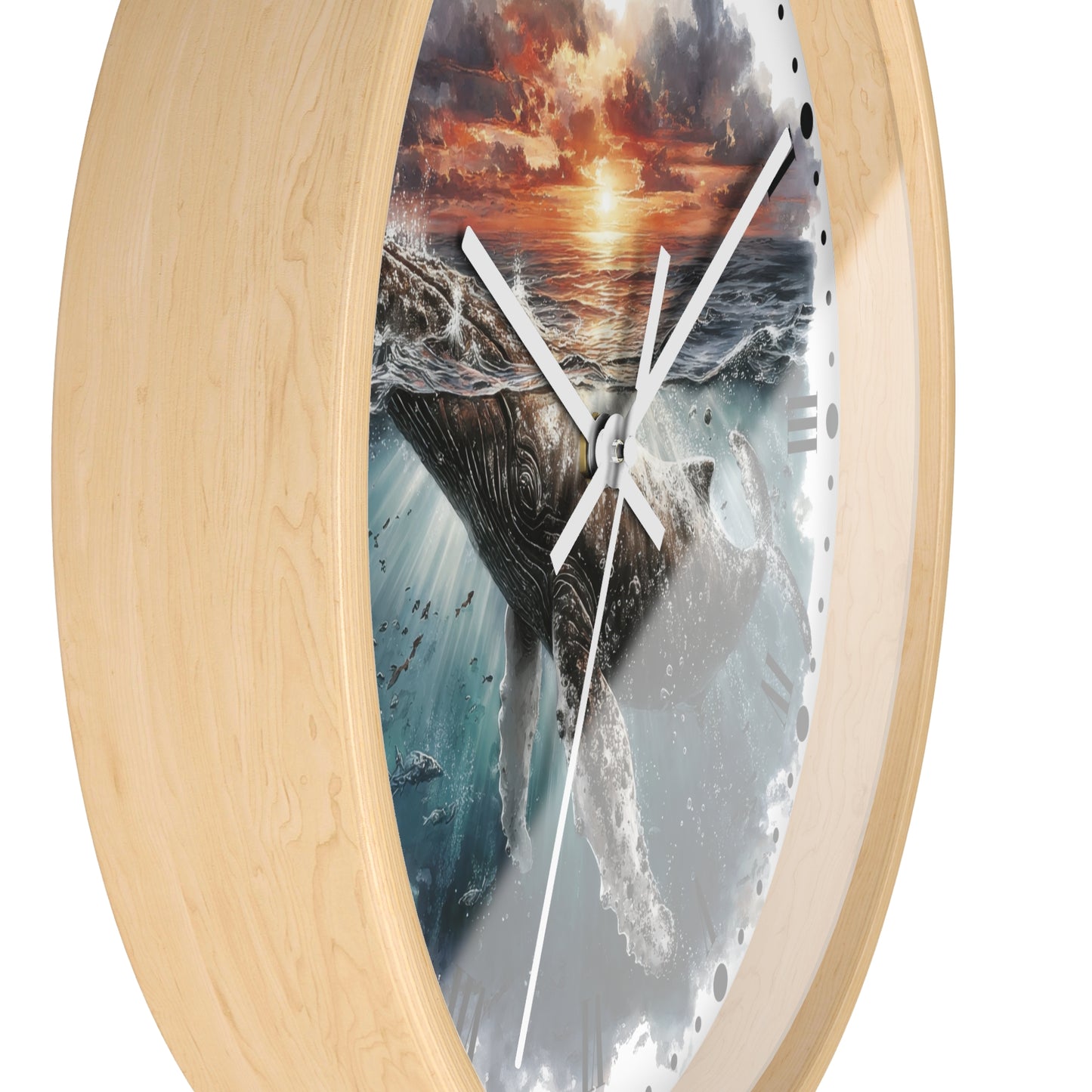Round wall clock with a light natural wood frame and a printed ocean scene featuring a whale, waves, and a dramatic sunset sky. White clock hands are visible against a plain white background.