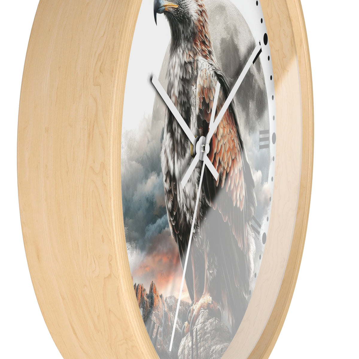 Round wall clock with a light natural wood frame and a printed scene of a large eagle over rocky mountains and clouds on the face, shown against a plain white background.