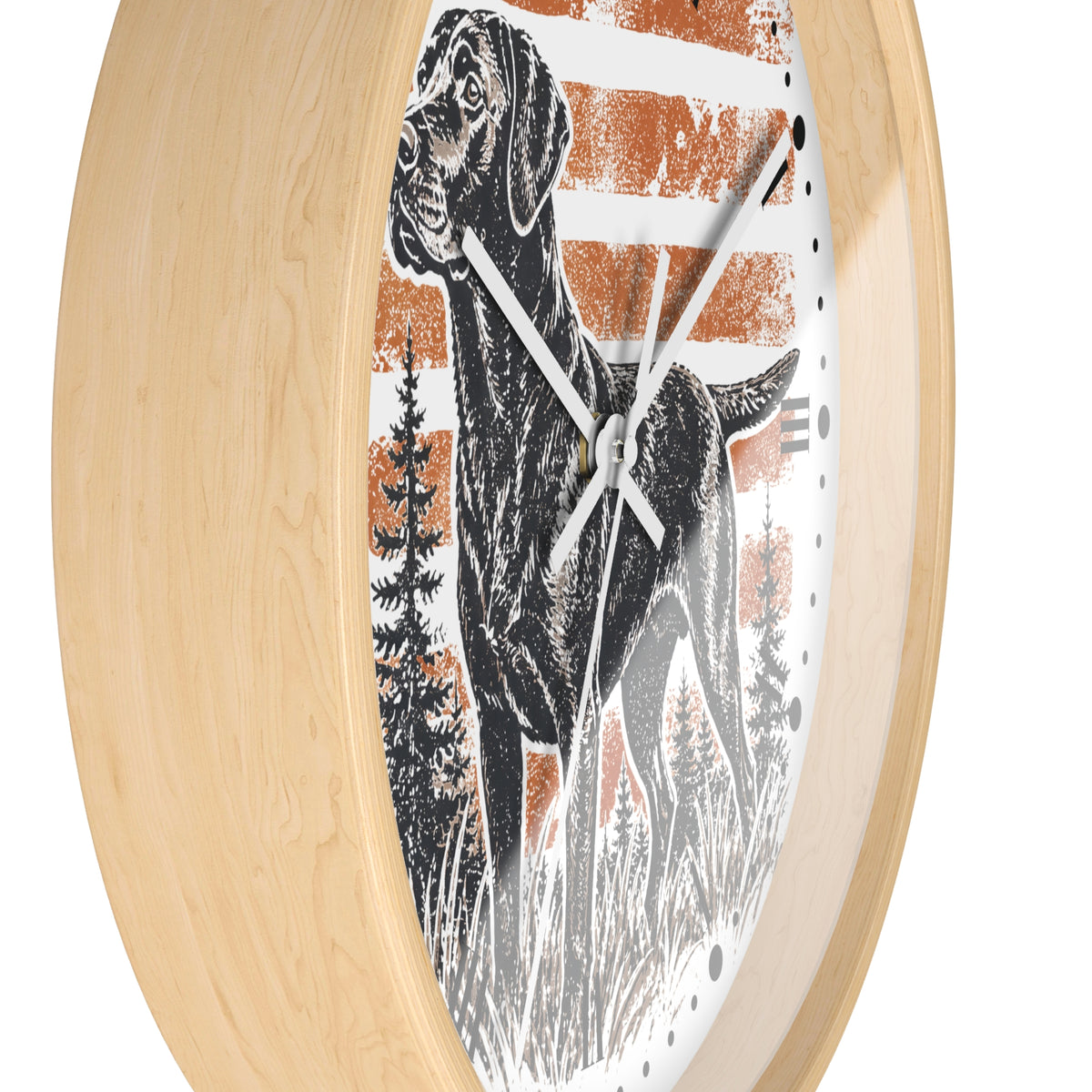 Round wall clock with a light natural wood frame and a printed dog illustration on the face, set against a plain white background.