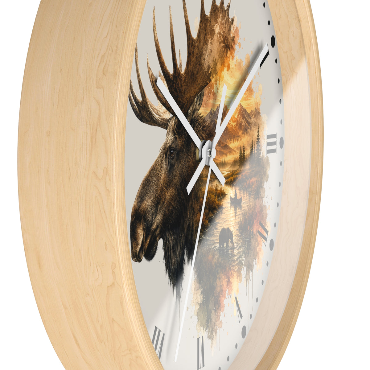 Round wall clock with a light natural wood frame and a printed moose head over an autumn forest scene on the dial, shown against a plain white background.
