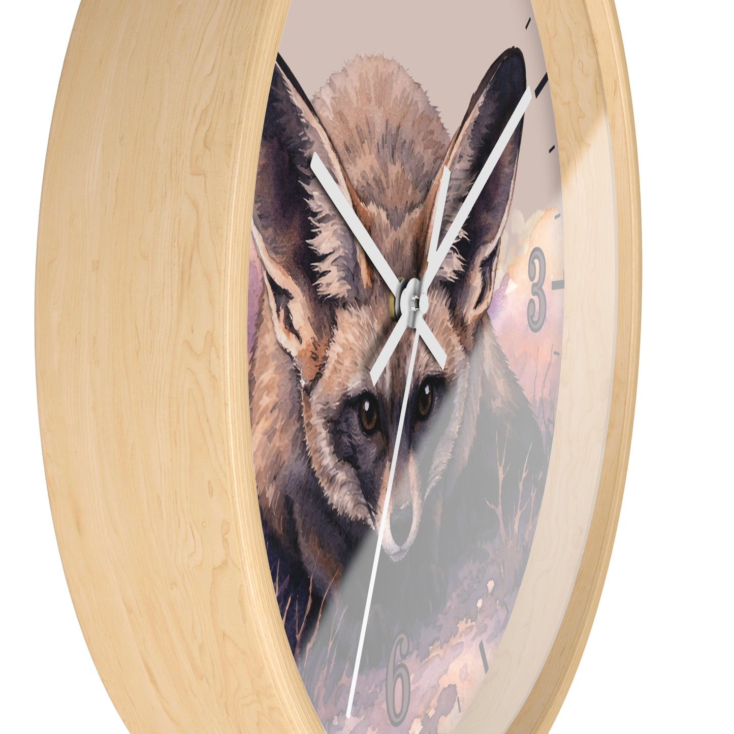 Round wall clock with a light natural wood frame and a printed fox face on the dial, shown against a plain white background.