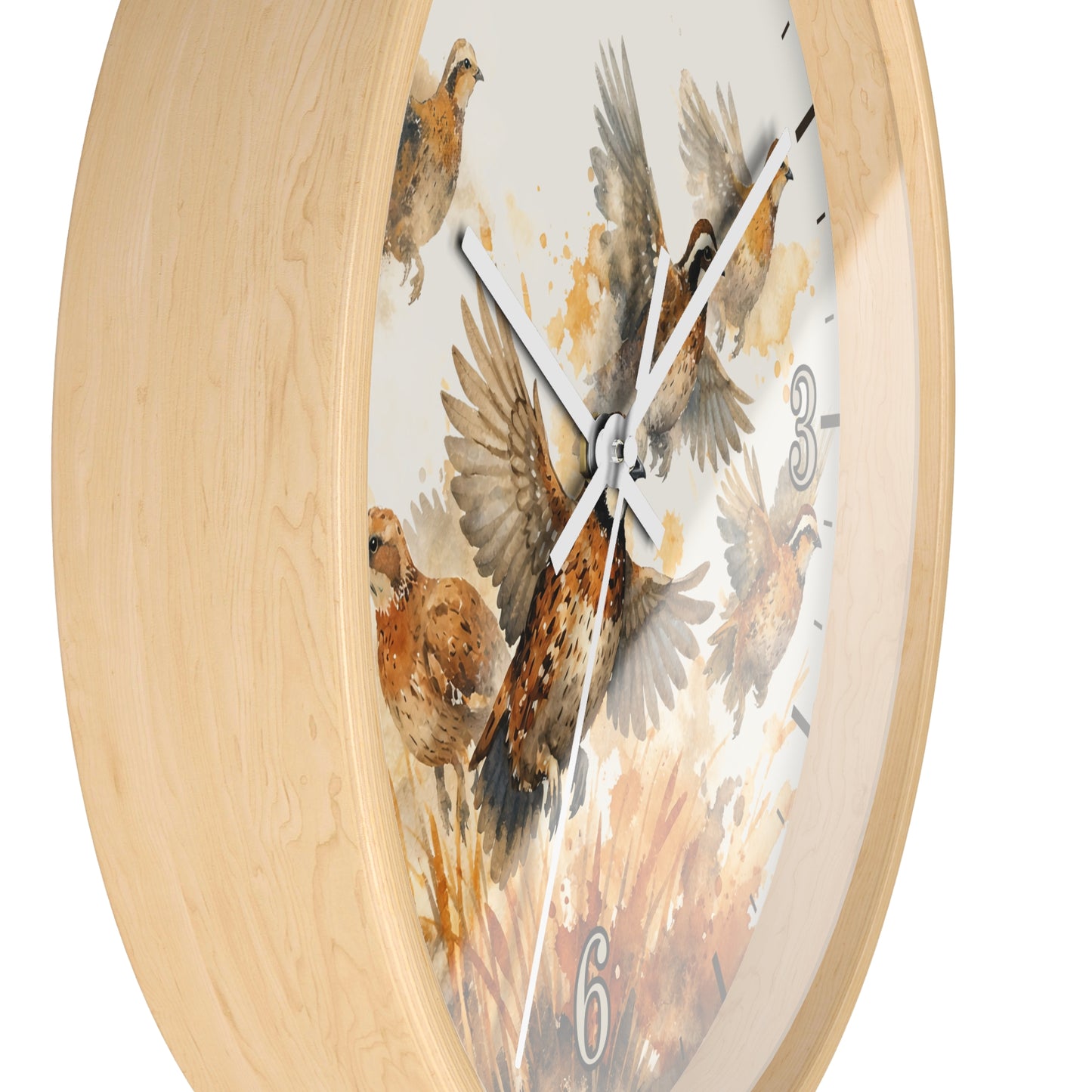 A close-up of a round wall clock with a light natural wood frame and a white face printed with watercolor-style birds in brown, beige, and gray tones.