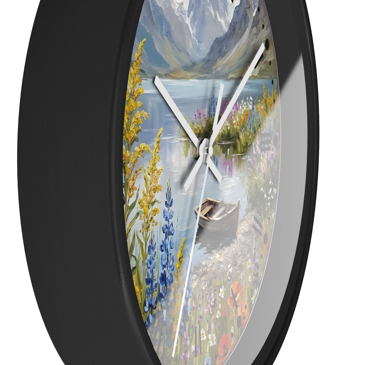Round wall clock with a black frame and a scenic landscape print featuring a lake, mountains, wildflowers, and a rowboat, shown against a white background.