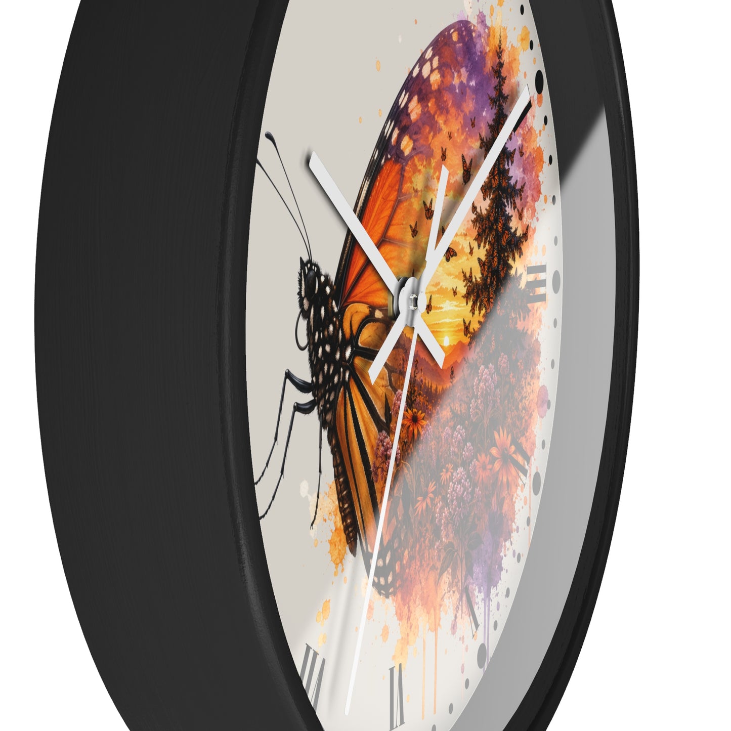 A close-up of a round wall clock with a black frame and a white dial featuring a large orange, yellow, and purple butterfly illustration with floral accents.