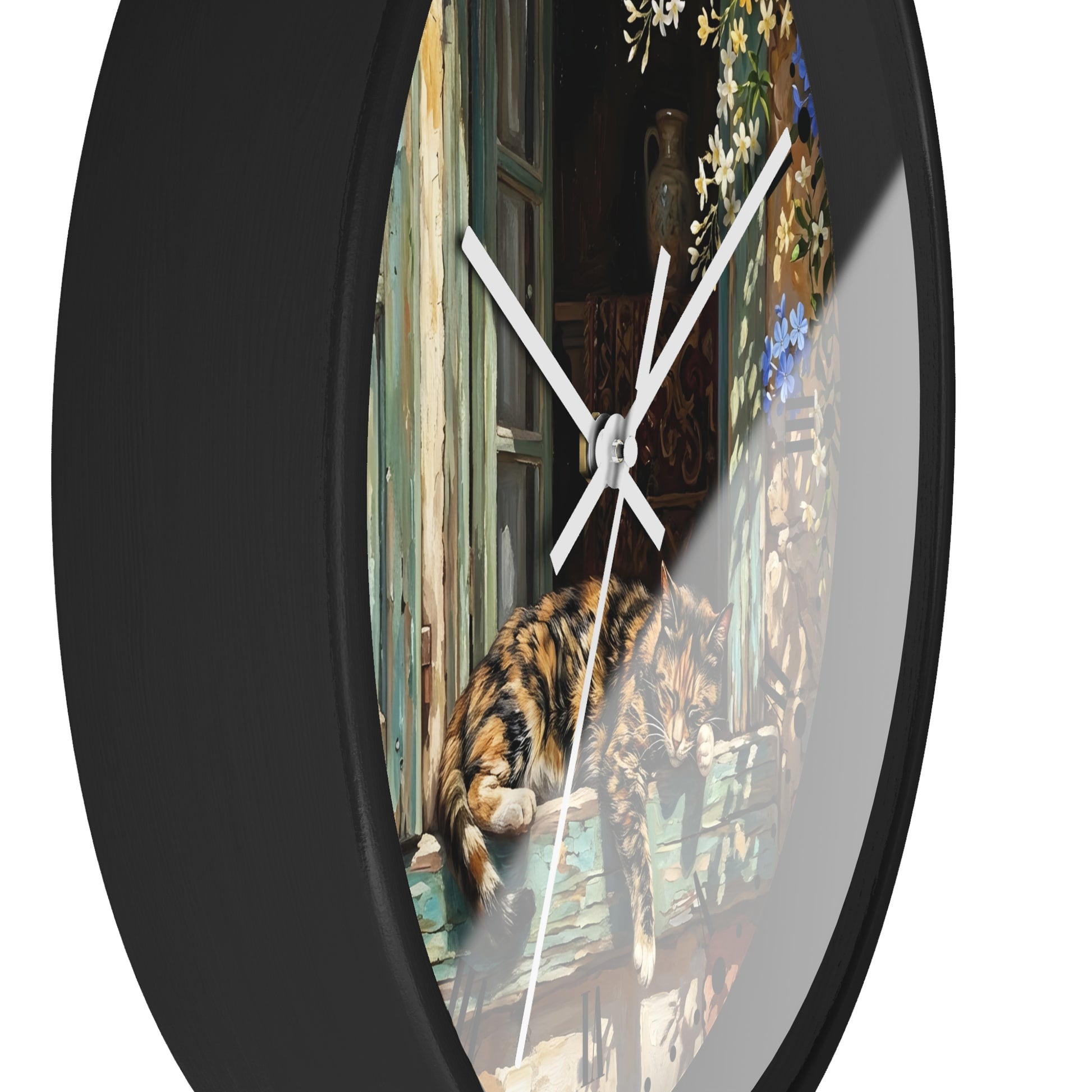 Round wall clock with a black frame and a printed scene on the face showing a cat resting on a weathered wooden windowsill, photographed against a plain white background.