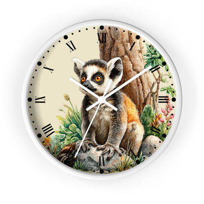 Round wall clock with a white frame and a printed illustration of a lemur sitting in front of a tree, with Roman numerals and white clock hands on a light cream face.
