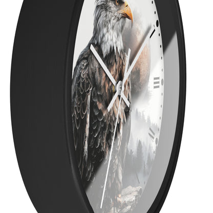 A close-up of a round wall clock with a black frame and a printed face featuring a detailed bald eagle over a misty mountain landscape.