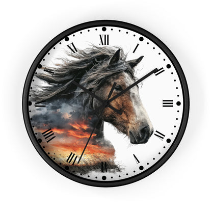 Round wall clock with a black frame and a white face featuring a detailed illustration of a horse's head over a dramatic orange and gray sunset scene. The clock has black Roman numerals and black hands, shown against a plain white background.