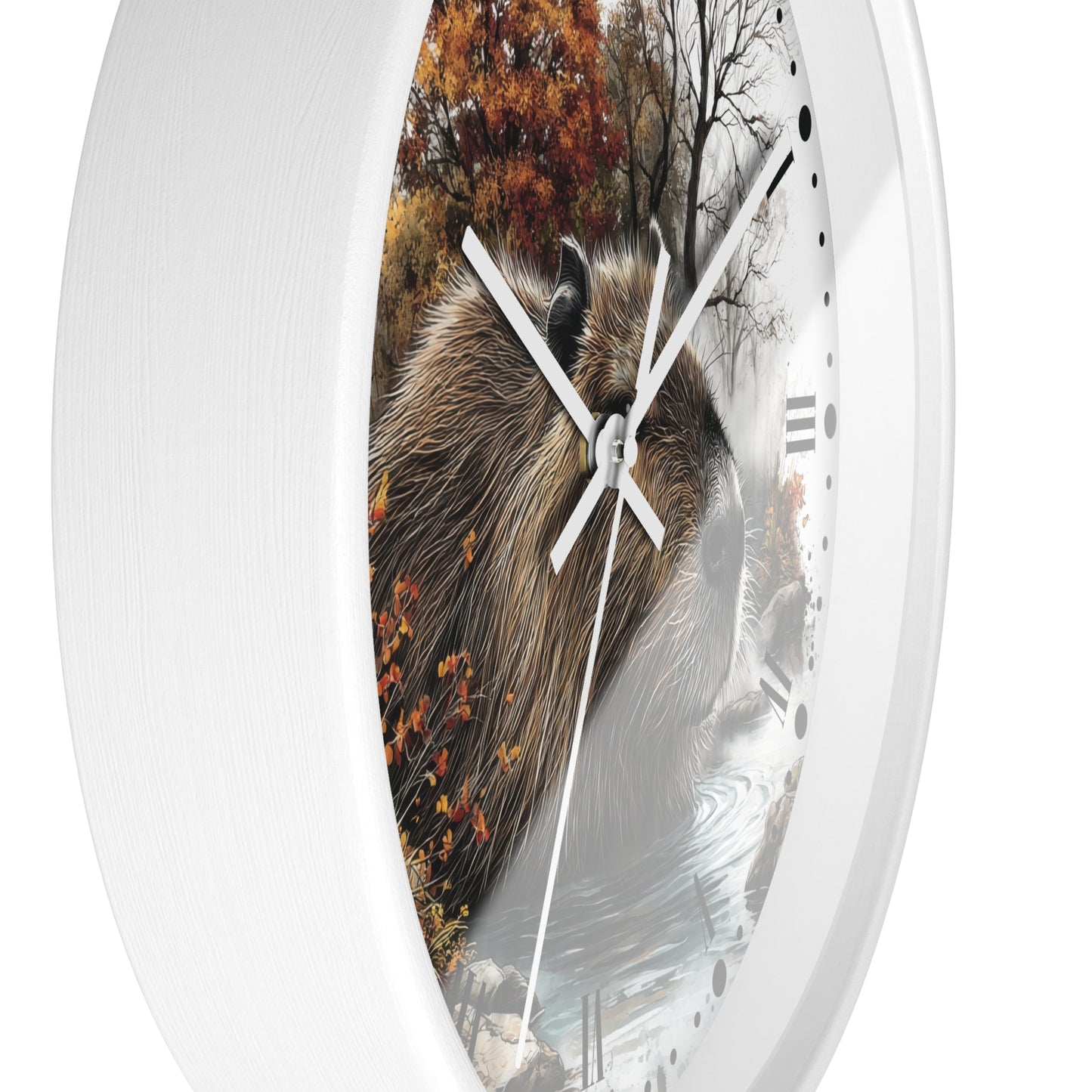 A round wall clock with a white frame and a printed nature scene on the face, featuring a capybara in front of autumn trees and water. The clock has white hands and black Roman numerals.