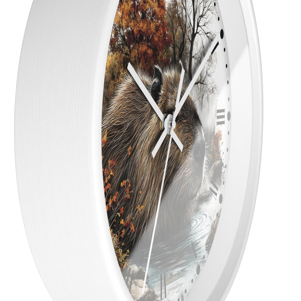 A round wall clock with a white frame and a printed nature scene on the face, featuring a capybara in front of autumn trees and water. The clock has white hands and black Roman numerals.