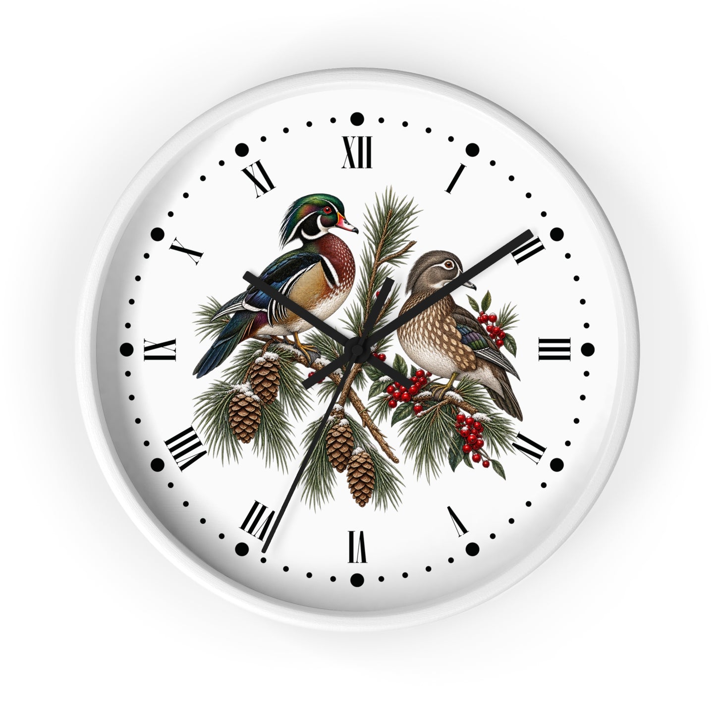 A round wall clock with a white face and outer rim, featuring black Roman numerals and hour markers. The center is decorated with an illustration of two wood ducks perched on pine branches with pinecones and red berries.