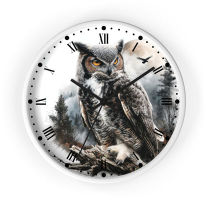 A round wall clock with a white frame and a printed design of a large owl perched on branches against a misty forest background. The clock face has black Roman numerals and black hands, shown on a clean white background.