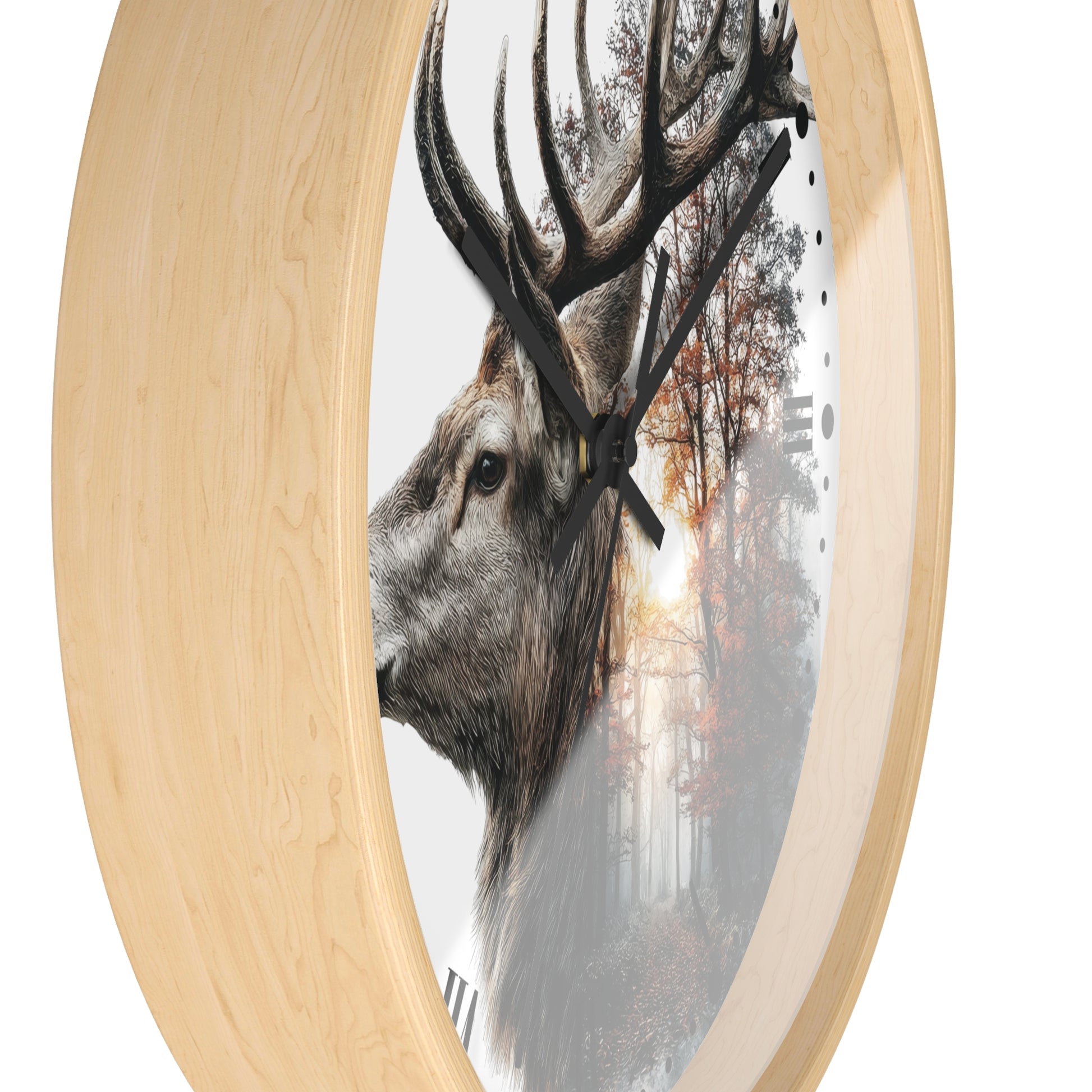 Round wall clock with a light natural wood frame and a printed deer head over a forest scene on the clock face, shown against a plain white background.