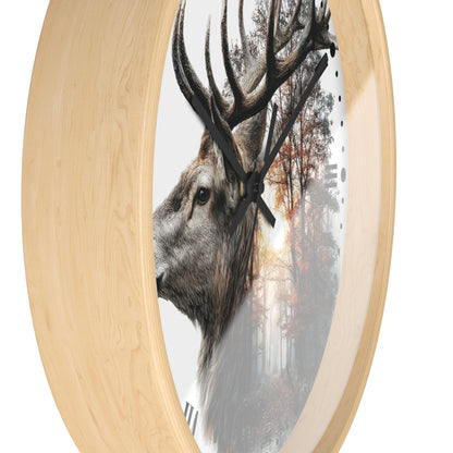 Round wall clock with a light natural wood frame and a printed deer head over a forest scene on the clock face, shown against a plain white background.