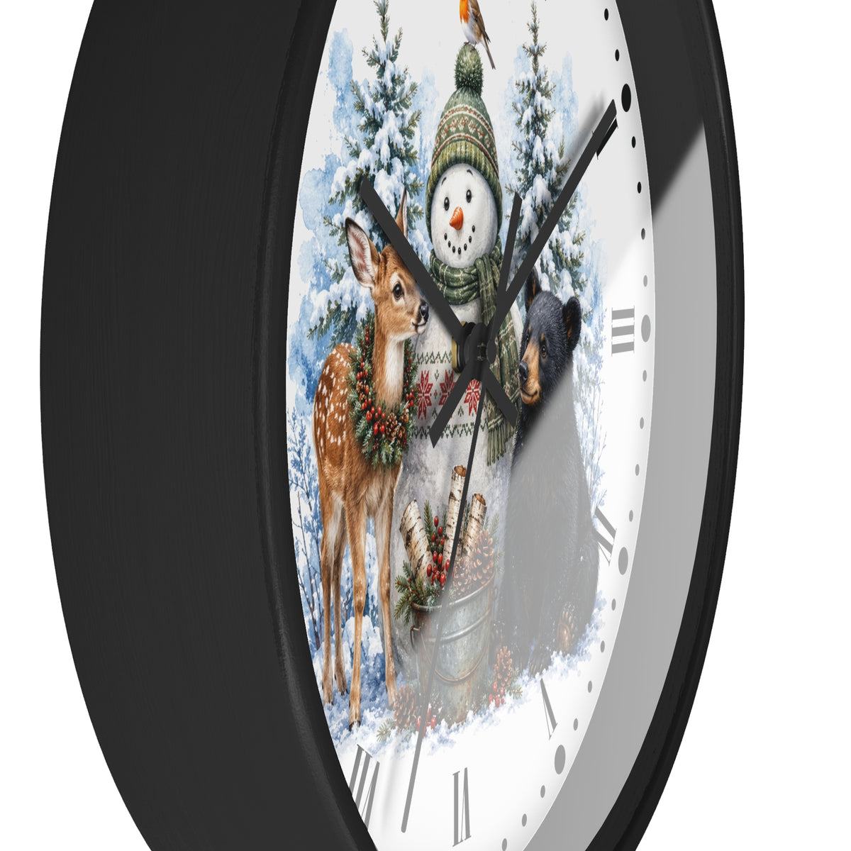 A round wall clock with a black frame and a white face featuring a winter holiday illustration of a snowman, deer, bear, and snowy trees.
