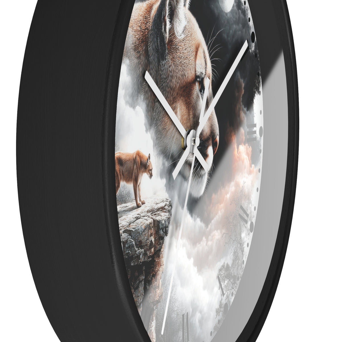 A round wall clock with a matte black frame and a printed face featuring a large cougar head, a smaller cougar standing on a rock, and dramatic clouds. White clock hands are visible against a white background.