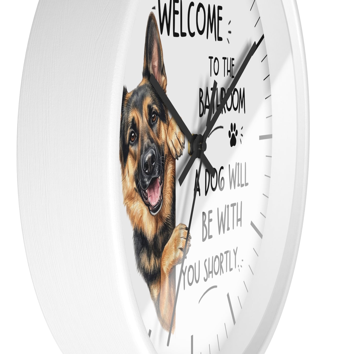 A round white wall clock with a printed illustration of a German Shepherd dog and the text 'WELCOME TO THE BATHROOM A DOG WILL BE WITH YOU SHORTLY.