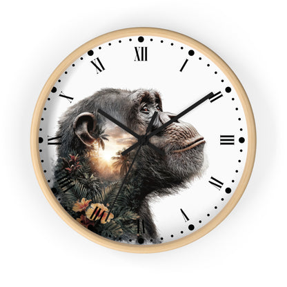 A round wall clock with a light wood frame and a white face featuring a detailed illustration of a chimpanzee with tropical foliage and a glowing sun motif. The clock has black Roman numerals and black hands.