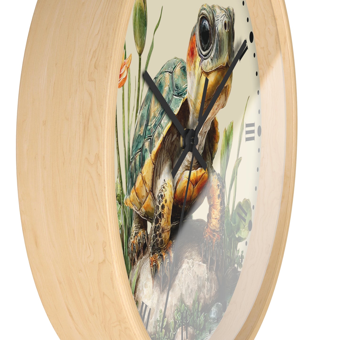 Round wall clock with a light natural wood frame and a printed turtle illustration on the face, shown against a plain white background.