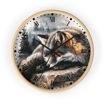 Round wall clock with a light wood frame and a printed wolf resting on a rock in a misty forest scene. The clock face has black Roman numerals and black hands, shown against a plain white background.