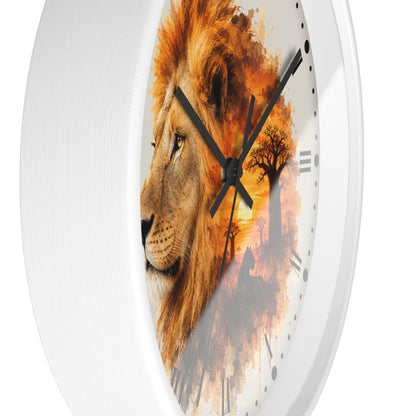 A round wall clock with a white frame and a printed face featuring a lion profile over an orange sunset scene with tree silhouettes and black Roman numerals.