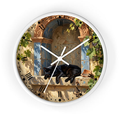 A round wall clock with a white frame and a printed illustration of a black cat resting on a stone windowsill beneath an arched window, with Roman numerals and white clock hands.
