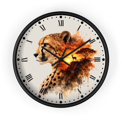 A round wall clock with a black frame and Roman numerals, featuring a printed design of a cheetah profile blending into an African savanna landscape with a sunset and tree silhouette on a light background.