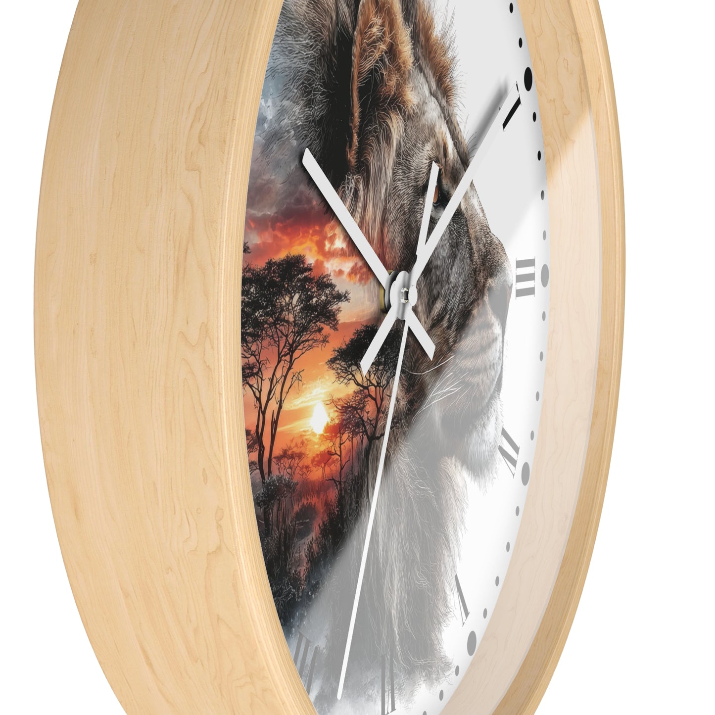 Round wall clock with a light natural wood frame and a printed face featuring a lion face over an African savanna sunset scene, shown on a white background.