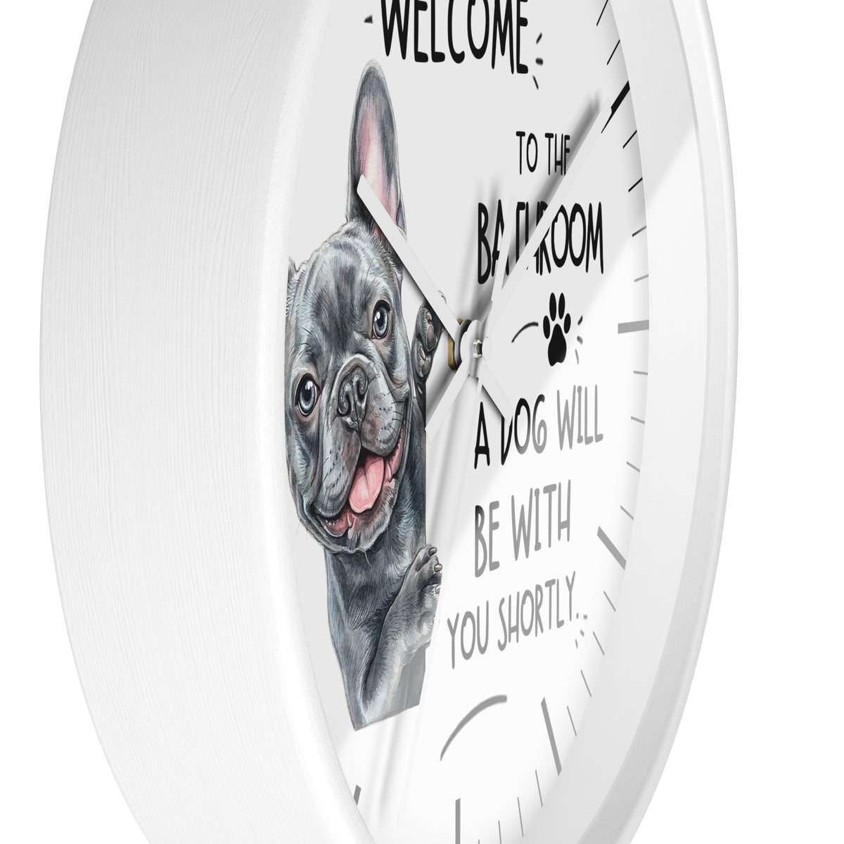 A white round wall clock with a French bulldog illustration and the text 'WELCOME TO THE BAR ROOM A DOG WILL BE WITH YOU SHORTLY.' on a white background.