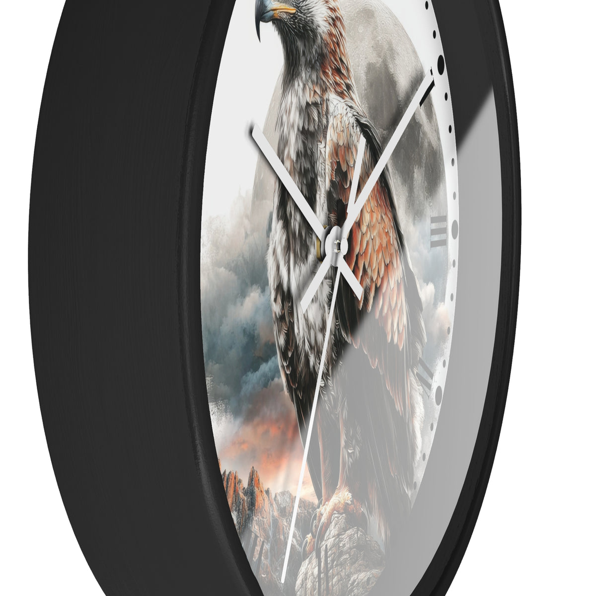A round wall clock with a black frame and a printed design of a large eagle perched on rocky mountains under a cloudy sky. The clock has white hands and no visible brand name.