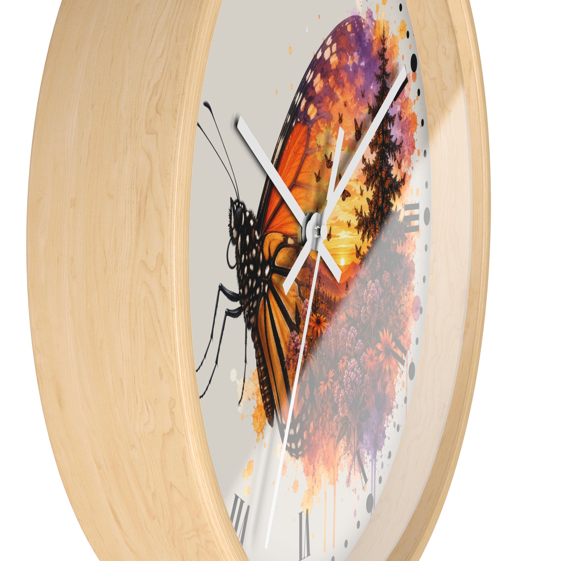 Round wall clock with a light natural wood frame and a white dial featuring a large orange, black, and purple butterfly illustration over a floral watercolor background.