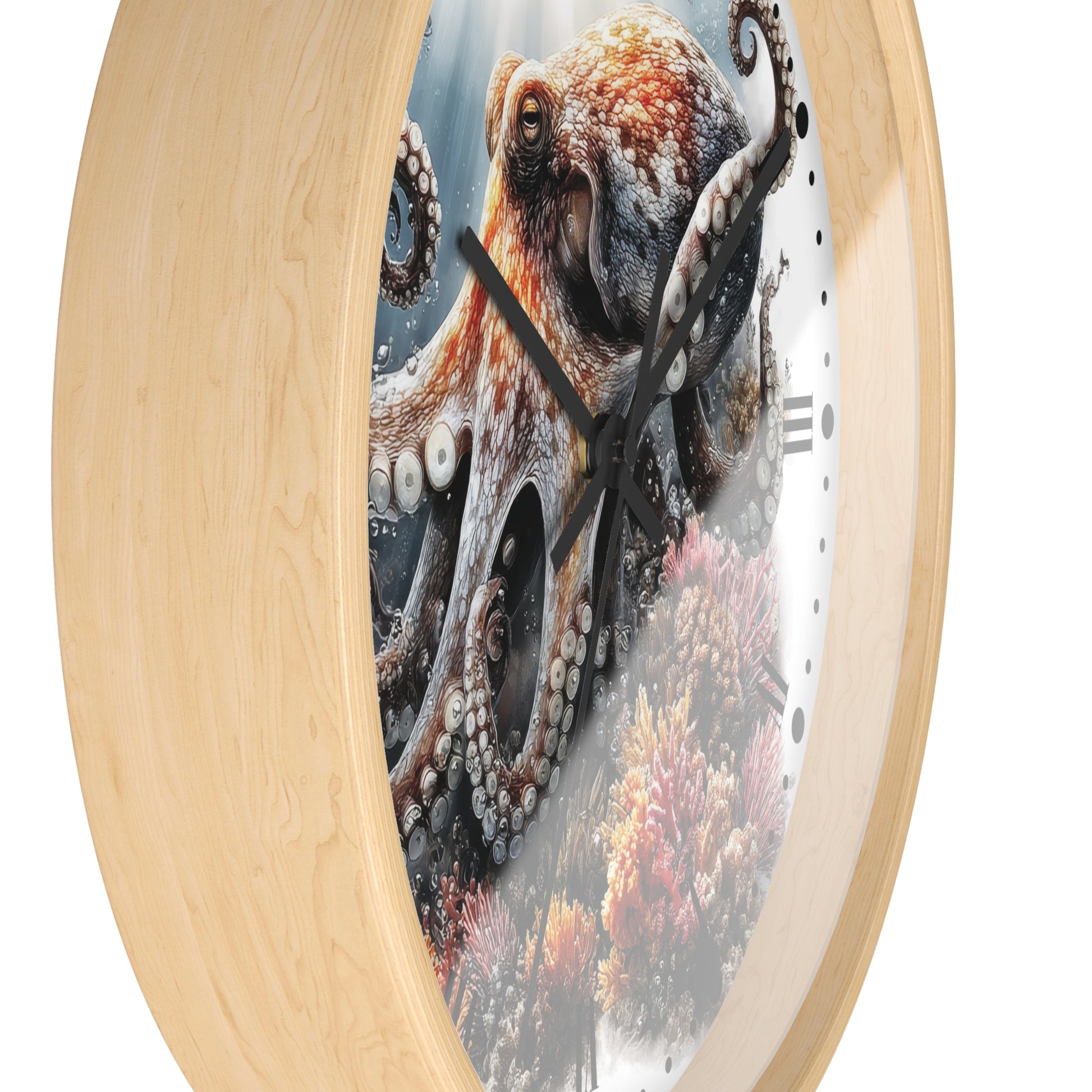 Round wall clock with a light natural wood frame and a printed octopus and coral reef design on the face, shown against a plain white background.