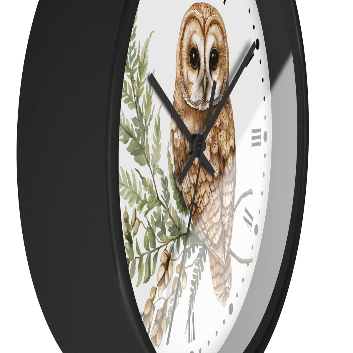 A close-up of a round wall clock with a black frame and a white face featuring a detailed illustration of a brown barn owl over green leaves.