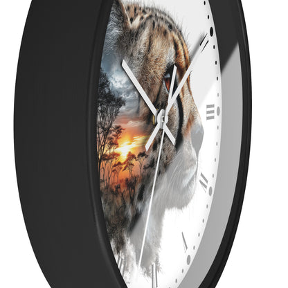 A close-up of a round wall clock with a black frame and a white face, featuring a cheetah face and a sunset landscape printed on the dial.
