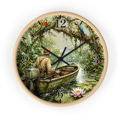 Round wall clock with a light natural wood frame, featuring a printed tropical jungle scene with a man in a motorboat, colorful macaws, water lilies, and black Arabic numerals on a white background.
