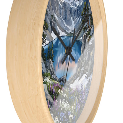 Round wall clock with a light natural wood frame and a scenic mountain lake print on the dial, shown against a plain white background.