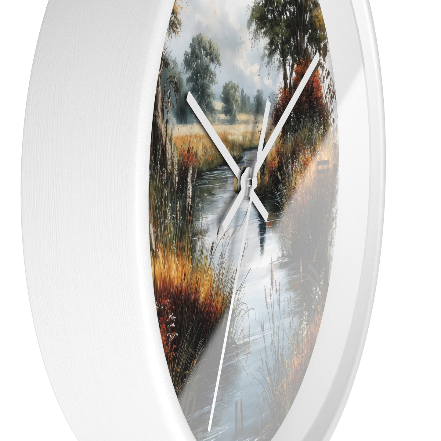 Round wall clock with a white frame and a scenic landscape print of a reflective stream bordered by grasses and trees, featuring white hands on a white background.