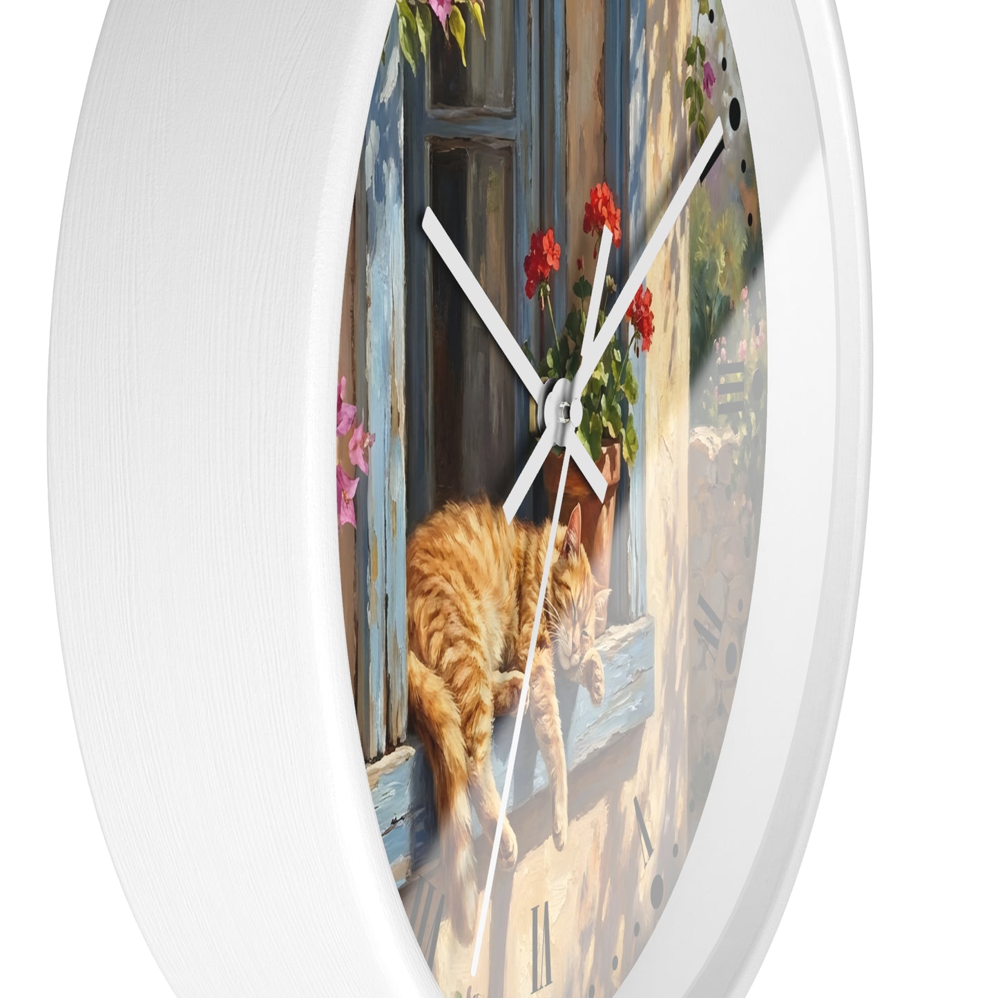 Round wall clock with a white frame and a printed illustration of an orange tabby cat resting on a sunlit windowsill beside red flowers and blue shutters, shown against a plain white background.
