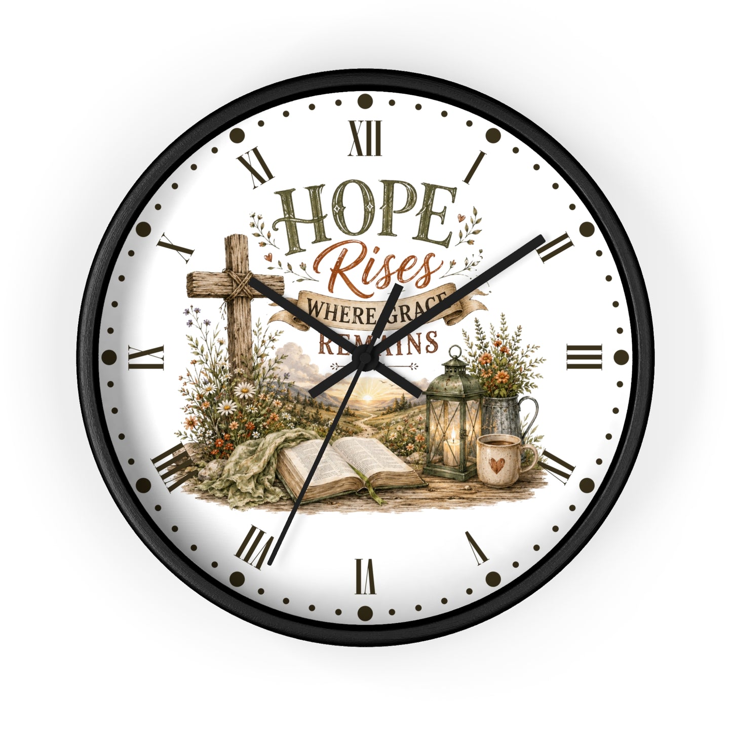 A round wall clock with a black frame and a white face featuring a Christian-themed illustration and the words 'HOPE Rises WHERE GRACE REMAINS.' The clock includes Roman numerals, black hands, and decorative floral and rustic scene details on the dial.