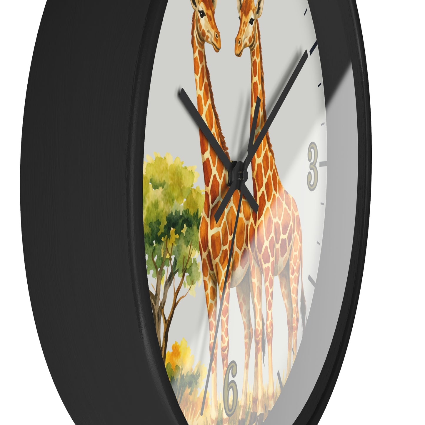 A close-up of a round wall clock with a black frame and a white dial featuring an illustrated giraffe scene with two giraffes, a tree, and black numerals.