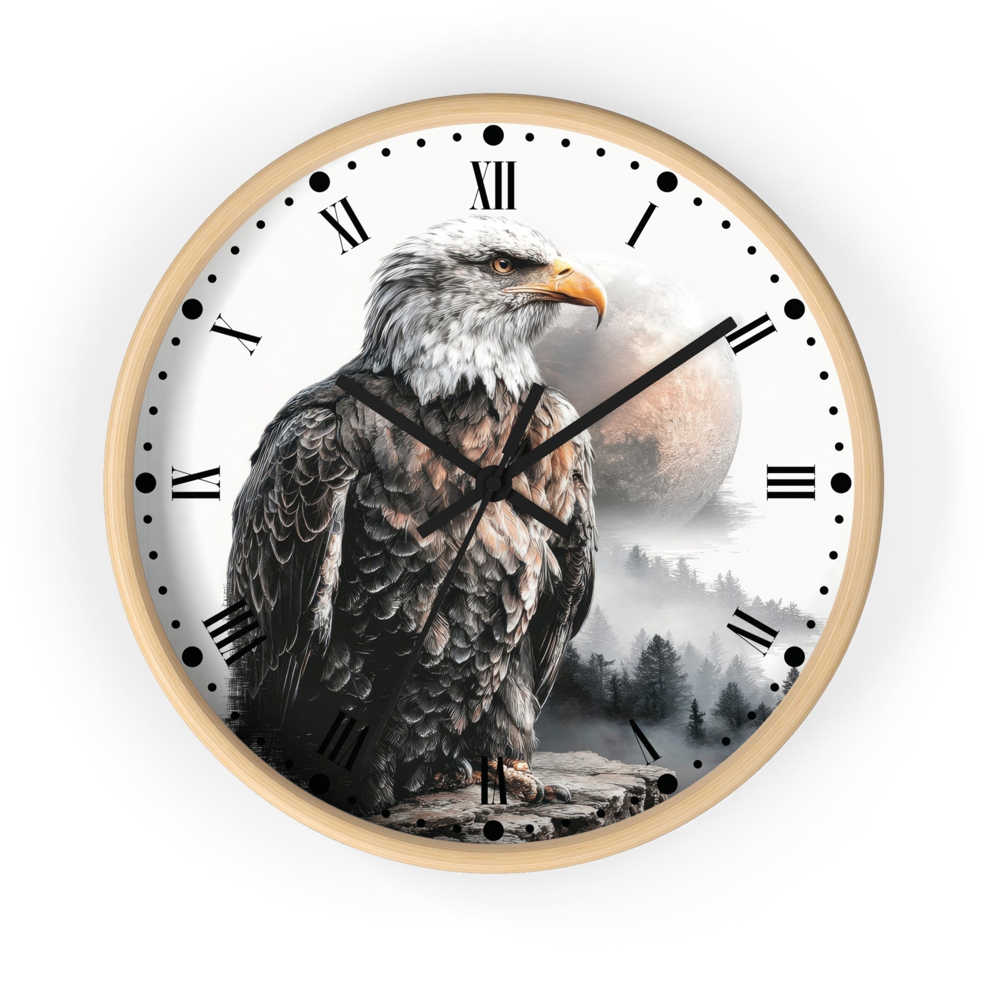 A round wall clock with a light wood frame and a printed dial featuring a bald eagle in front of a mountain landscape and large moon. The clock has black Roman numerals, black hour and minute hands, and white dots for seconds, shown on a plain white background.