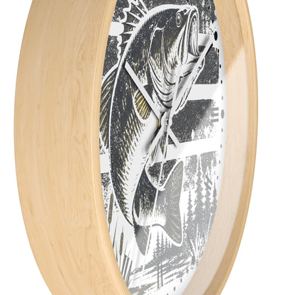 Round wall clock with a light natural wood frame and a black-and-white fish illustration on the face, shown against a plain white background.