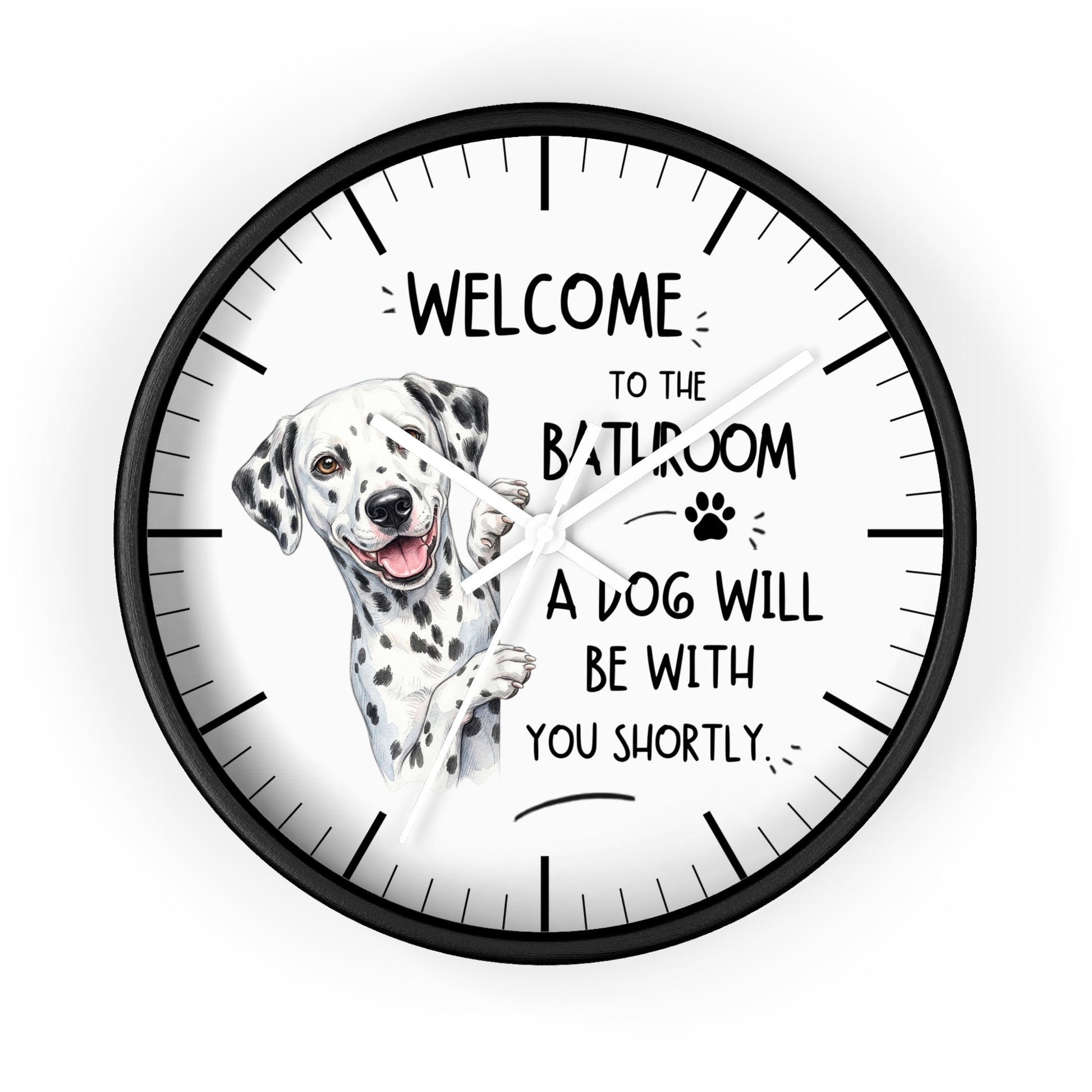 A round wall clock with a black frame and white face, featuring a Dalmatian illustration and the text 'WELCOME TO THE BATHROOM A DOG WILL BE WITH YOU SHORTLY'.