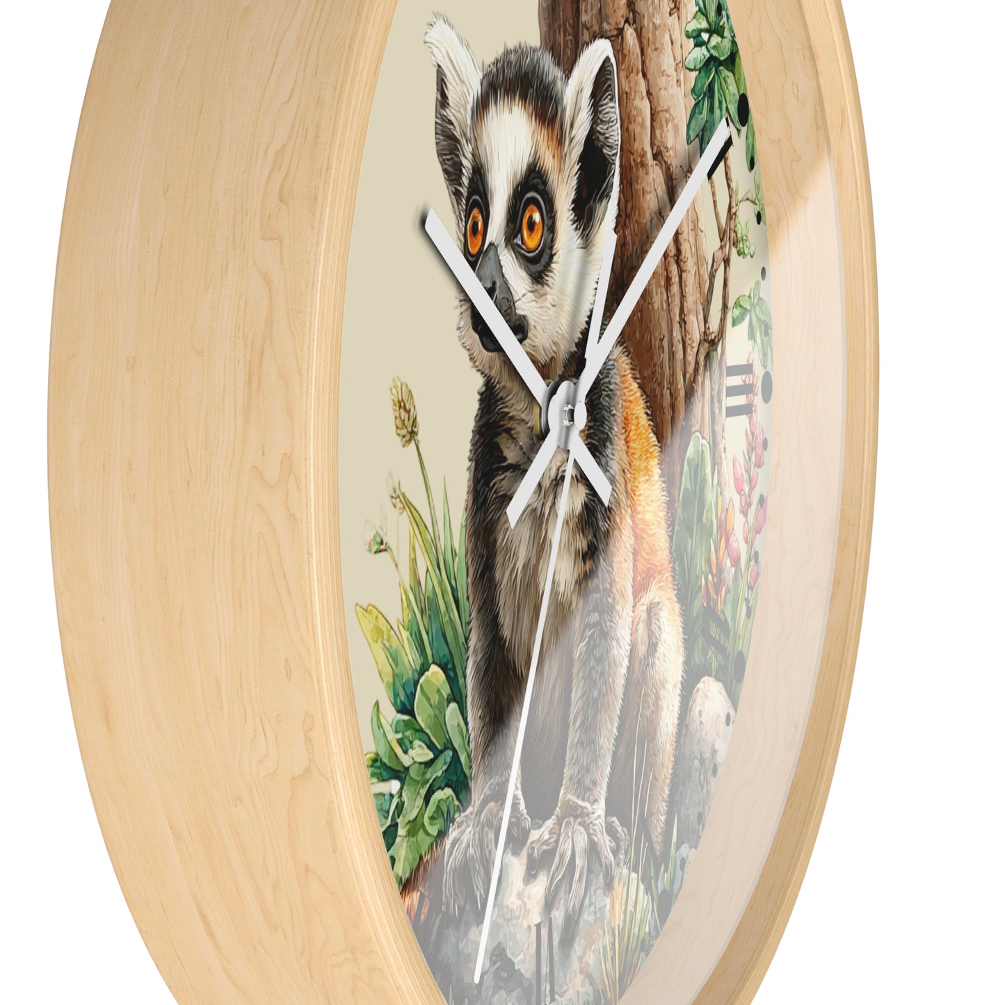 Round wall clock with a light natural wood frame and a printed illustration of a lemur on the face, with white clock hands and no visible numerals.