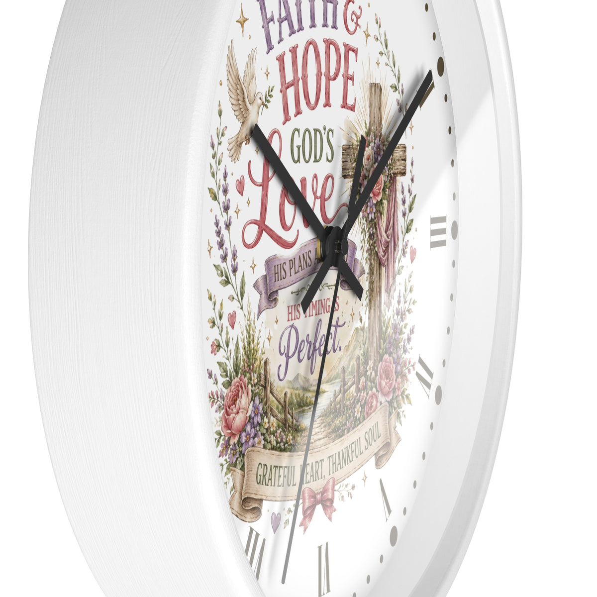 A white round wall clock with a decorative religious face featuring the words 'Faith & Hope God's Love His Plans His Timing is Perfect' surrounded by floral and bird illustrations.