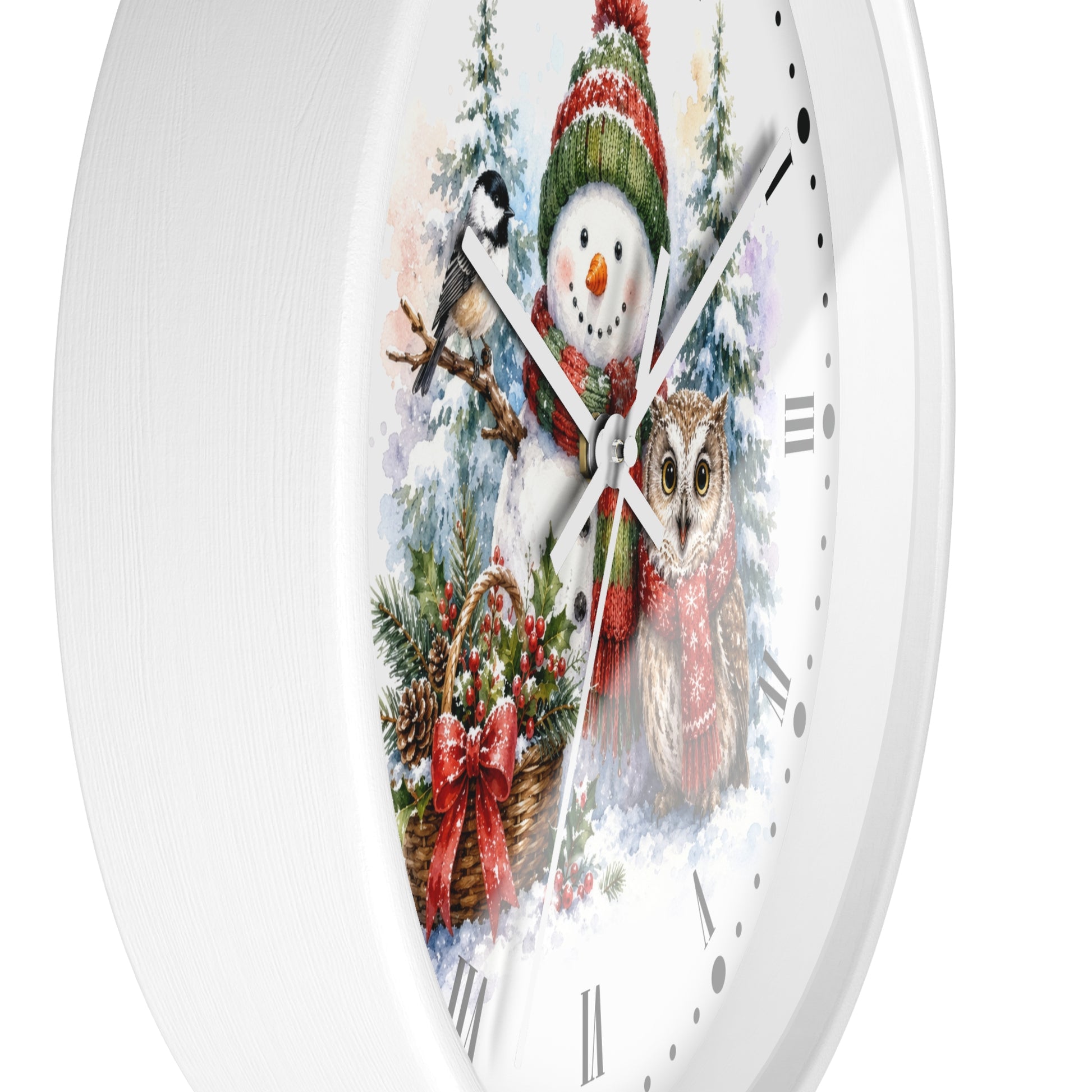 A round white wall clock with a festive winter illustration on the face, featuring a snowman in a red knit hat, a bird on a branch, and an owl in a snowy scene.