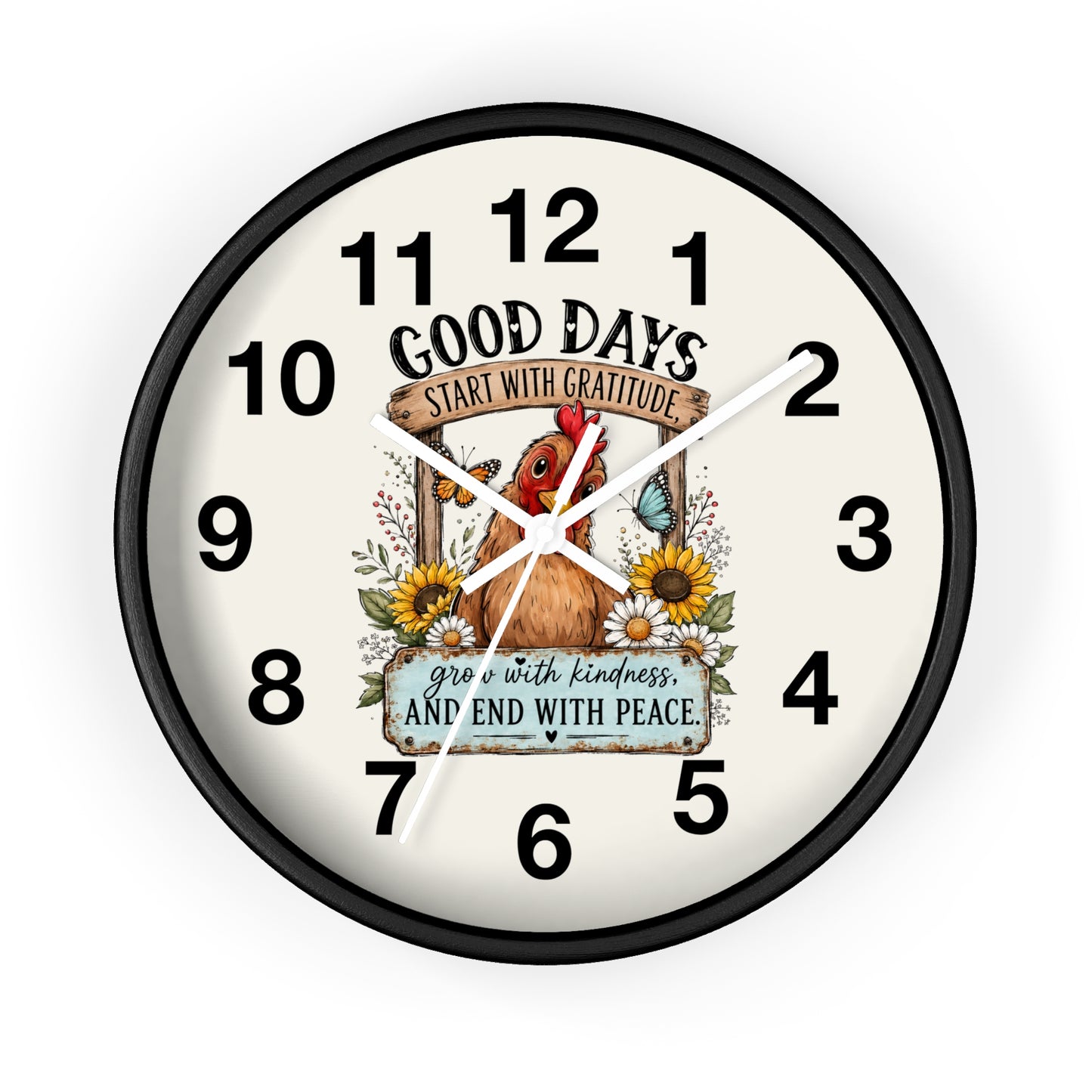 A round wall clock with a black frame and a cream-colored face, featuring a central illustration of a rooster, sunflowers, and a butterfly with the text 'GOOD DAYS START WITH GRATITUDE' and 'GROW WITH KINDNESS AND END WITH PEACE.'.