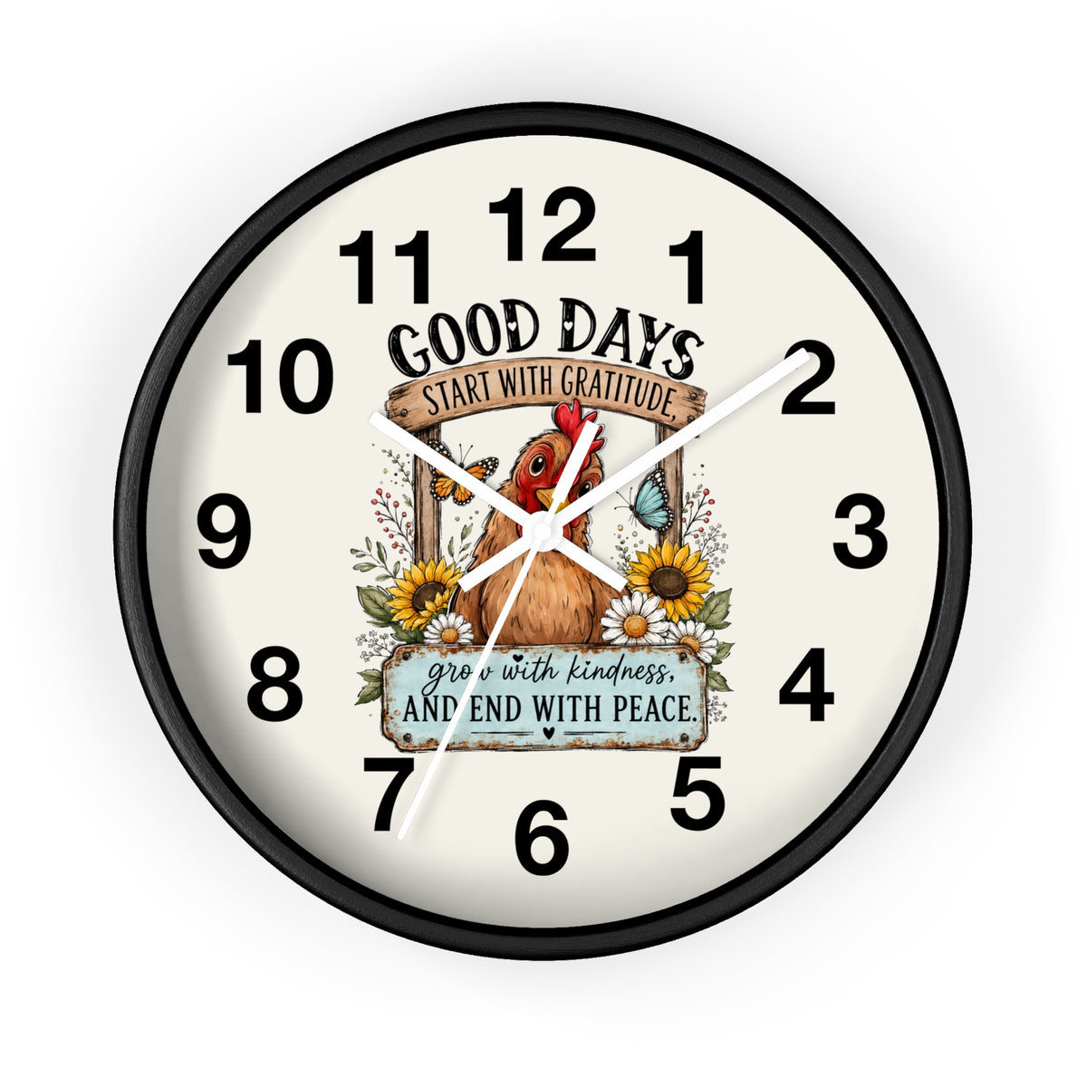 A round wall clock with a black frame and a cream-colored face, featuring a central illustration of a rooster, sunflowers, and a butterfly with the text 'GOOD DAYS START WITH GRATITUDE' and 'GROW WITH KINDNESS AND END WITH PEACE.'.