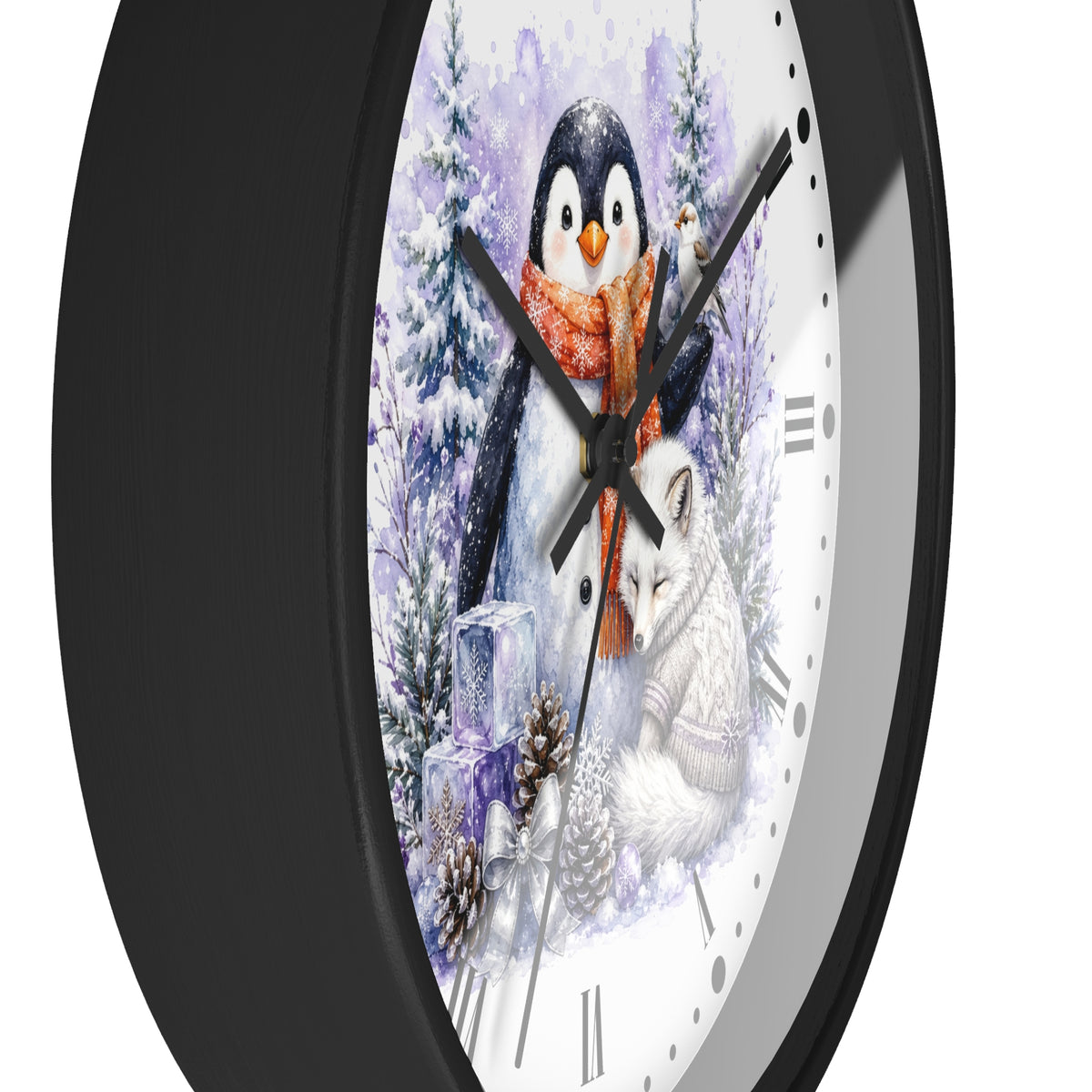 A round wall clock with a black frame and a white face featuring a winter illustration of a penguin in a red scarf and a white fox among snowy trees.